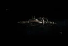 宇宙空間に浮かぶ光の灯ったスペースコロニーの遠景