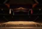 誰もいない相撲の土俵と吊り屋根、静かな国技館の館内