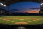 試合後の夕暮れの野球場と照明に照らされたマウンド