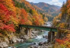 紅葉に染まる渓谷沿いを走る単線の線路と鉄橋、渡良瀬川の清流